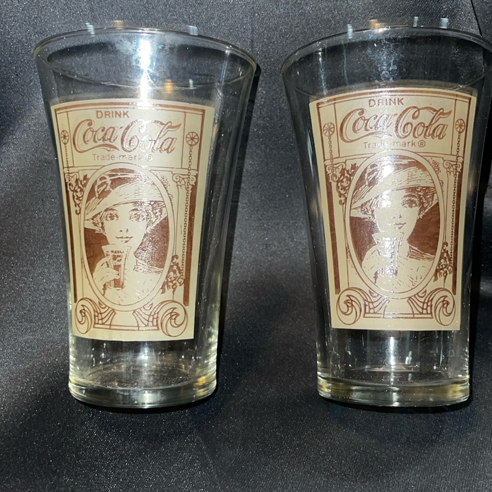 Coca Cola glasses. Sold in pairs Good condition